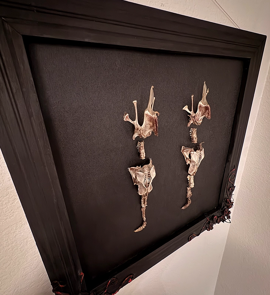 A high-contrast atmospheric shot of the Each-Uisce piece, emphasizing the "Ethereal Macabre" style and the haunting biological textures of the skeletal aquatic entity.